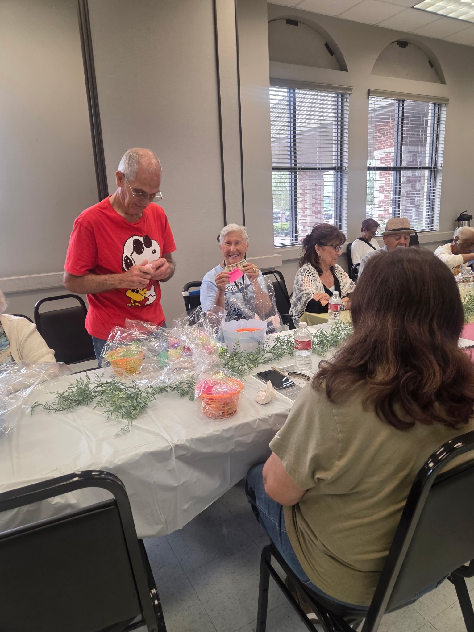 GYSA members assembling Easter baskets together